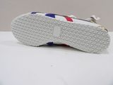a close up of a pair of shoes on a white surface