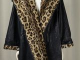 an image of a mannequin mannequin with a leopard print coat on it