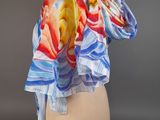 an image of a colorful scarf on a mannequin head