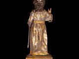 an image of a statue of a man with a crown on his head