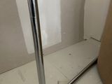 a mirror that is sitting on the floor next to a box