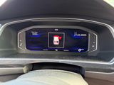 an image of a car dashboard with a digital display