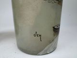 a cup with a picture of a man and a dog on it