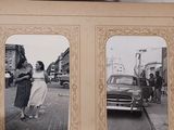 a book with pictures of people walking down the street