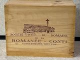 a wooden box with a picture of a building on it