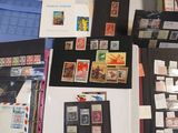 many different types of stamps on the table