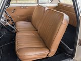 a tan leather seat in the back of a car