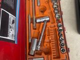 a tool kit that is sitting on the ground