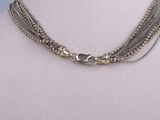a close up of a necklace on a mannequin mannequin mannequin mannequin mannequin mannequin mannequin mannequin