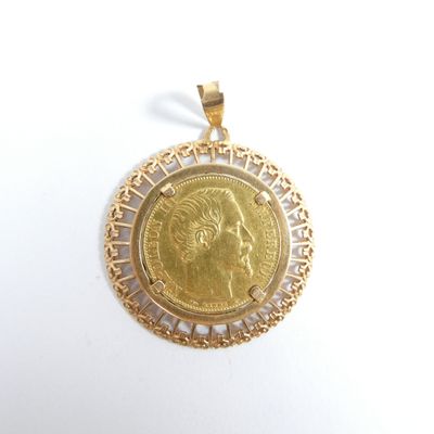 an image of a gold coin pendant with a woman ' s face on it