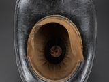 an overhead view of a baseball hat with a leather brimle