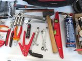 many tools and tools laid out on a table