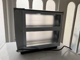 a microwave oven sitting on a counter in a room
