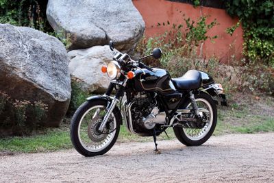 a motorcycle that is parked on the side of the road