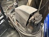 a small machine that is sitting in a room