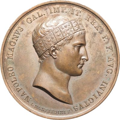 gros plan d'une pièce de monnaie sur laquelle figure une tête d'homme