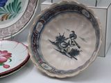 three plates that are sitting on a table