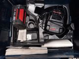 an open suitcase with tools in it on a table
