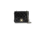 Mini sac à rabat Chanel en cuir d'agneau matelassé noir