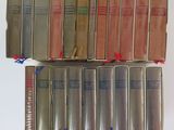 a lot of books that are sitting on a table