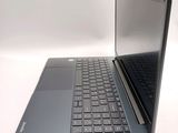 a laptop that is open and sitting on a table