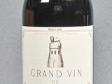 a bottle of wine that is sitting on a table