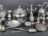 a lot of silver items that are on a table