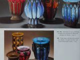 a picture of a book with pictures of vases on it