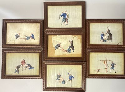 several framed pictures of people playing with a dog and a cat
