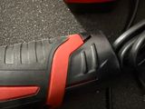 an image of a corded corded drill with a battery attached to it