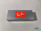 the box is empty and ready to be packed with a pair of sunglasses