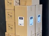 many boxes stacked on top of each other on a pallet