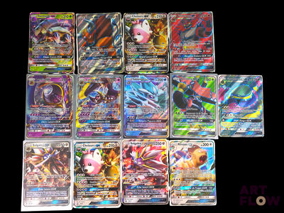 a lot of pokemon cards on a black background