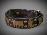 a black and gold bracelet with elephants on it