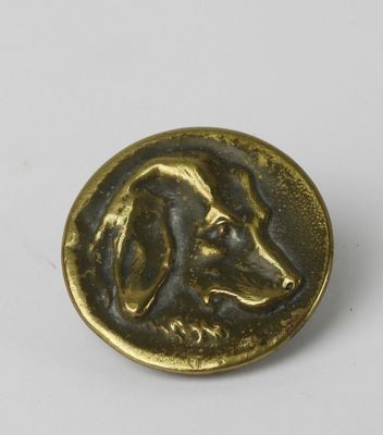 an image of a gold coin with a dog on it