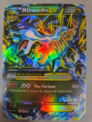 gros plan d'une carte pokemon sur une table