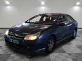 a picture of a blue car parked in a garage