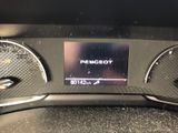 the dashboard of a car with a digital display in the center