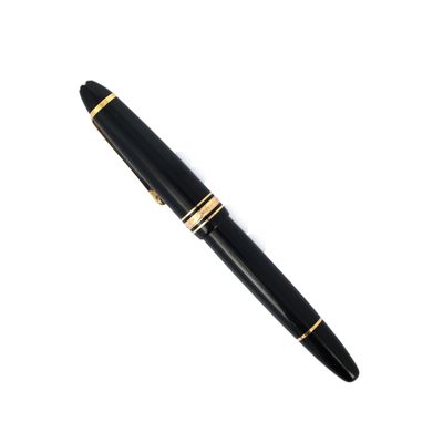 a close up of a pen on a white background