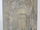 an image of a stone plaque with a door in the middle