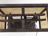 a picture of a window that has two chairs inside of it