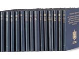 six books in a row on a white background with a blue cover