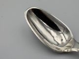 a spoon that is sitting on a table