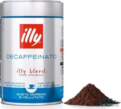 une boîte de grains de café à côté d'une boîte de café moulu