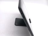 a close up of a cell phone on a stand