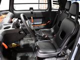 a picture of a car with a steering wheel and a seat