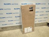 a cardboard box sitting on the floor next to a wall