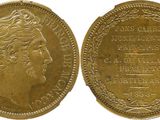 an image of a gold coin with a woman ' s face on it