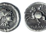 a silver coin with a horse and rider on it