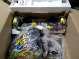 a box full of assorted skateboards and other items